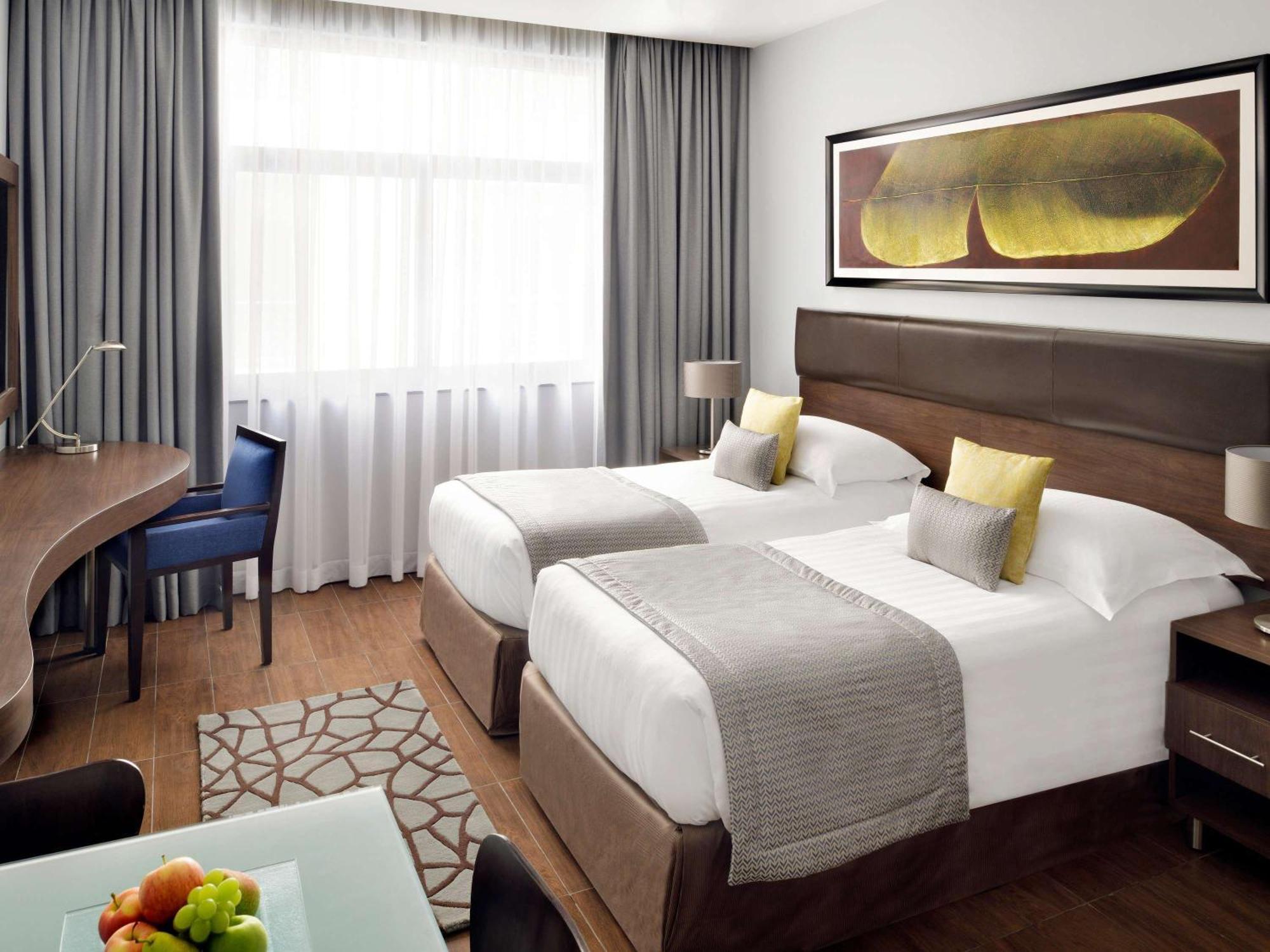 Moevenpick Hotel Apartments Al Mamzar Dubaj Exteriér fotografie A room at the hotel